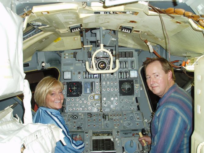 Mark and Judy Wells in Lunar Module trainer